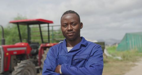 Confident Young Farmer Standing Proud in a Field - Download Free Stock Images Pikwizard.com