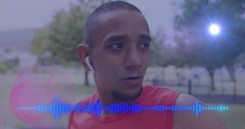 Athlete Listening to Music While Exercising Outdoors