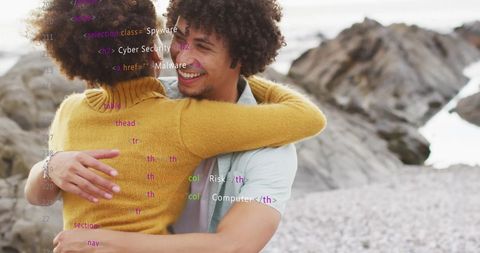 African American Couple Hugging on Beach with Digital Data Overlay