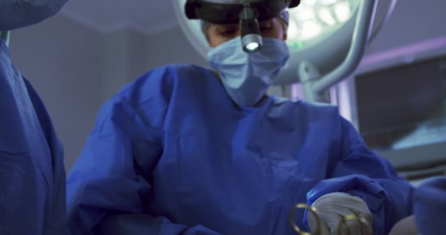 Close-up of Multi-ethnic surgeons performing surgery in operation theater at hospital - Download Free Stock Photos Pikwizard.com