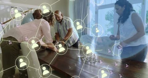 Arranging dining table with cooperative adults and digital network overlay