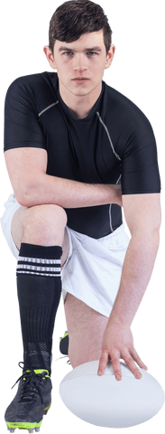 Transparent view of determined rugby player kneeling on field