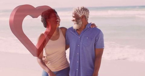 Elderly Couple Embracing Love and Happiness on Beach