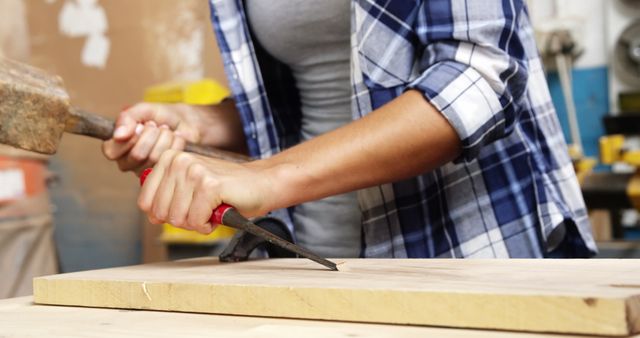 Female Carpenter Using Chisel and Mallet to Shape Wood - Download Free Stock Images Pikwizard.com