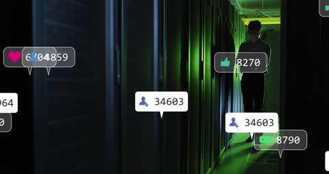 Engineer Monitoring Data Flow in Modern Server Room