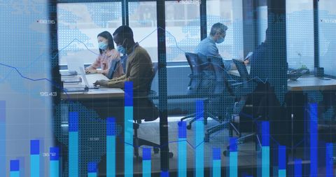 Diverse Team in Modern Office Analyzing Virtual Financial Data