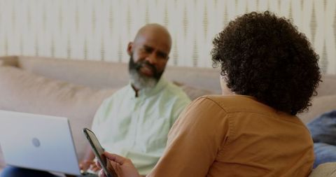 Friends Relaxing with Technology and Communication on Couch