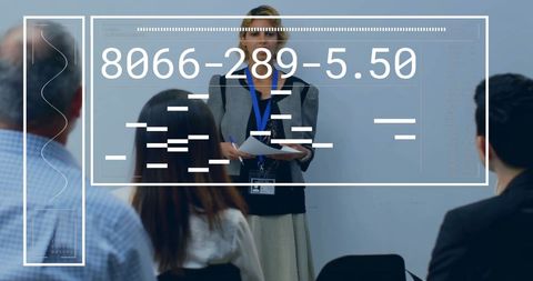 Business Professionals in Financial Analysis Meeting