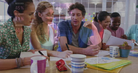 Diverse Business Team Analyzing Financial Data Graphics Overlay