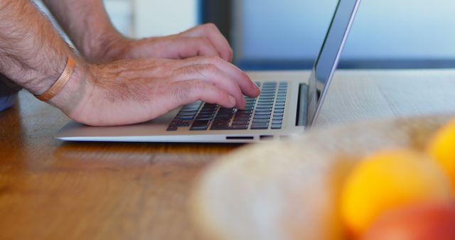 Hands Typing on Laptop Keyboard in Home Office Setting - Download Free Stock Images Pikwizard.com