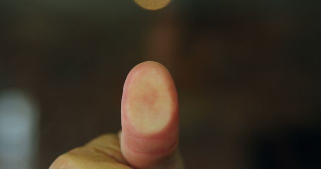 Close-up of Finger Making Impression on Glass Surface - Download Free Stock Images Pikwizard.com