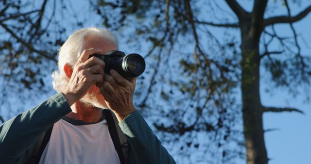 Senior Man Taking Photos with DSLR Camera Laughing in Outdoor Park - Download Free Stock Images Pikwizard.com