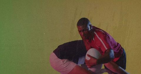 Intense Rugby Tackle Action against Studio Backdrop