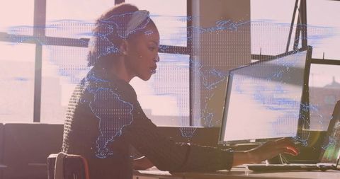 Tech-Savvy Businesswoman Typing with Holographic World Interface