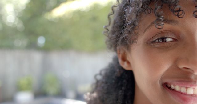 Close-Up of Smiling African American Woman Outdoors - Download Free Stock Images Pikwizard.com