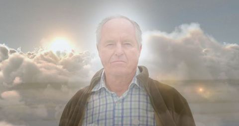 Senior man with ethereal glow symbolizing loneliness