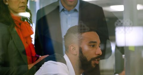 Engaged Professionals Collaborating in Modern Office Space