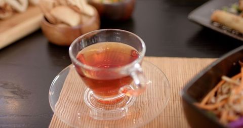 Relaxing afternoon tea with snacks on wooden table