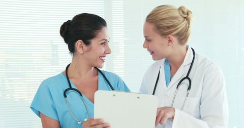 Medical Professionals Collaborating in Hospital Setting - Download Free Stock Images Pikwizard.com