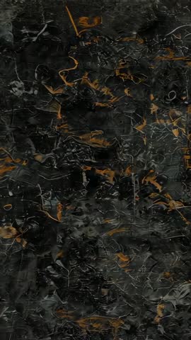Vertical loop flickering dark marble video with orange veins and subtle light shifts