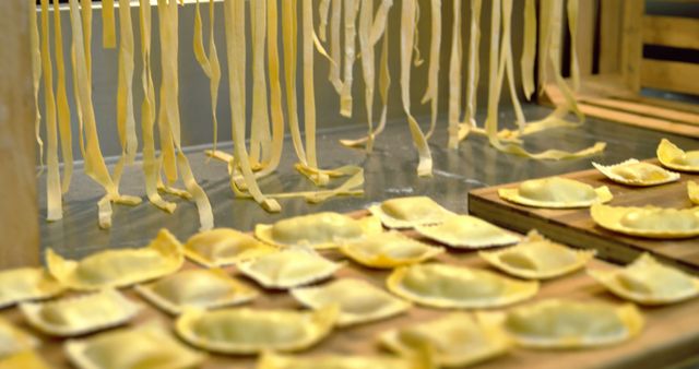 Raw dumplings and pasta lying in restaurant kitchen. Cooking and profession, food, meal, work and cook.