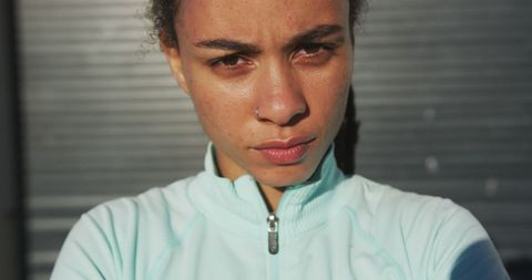 Determined African American Woman in Sportswear Outdoors