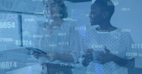 Diverse Businesswomen Engaging in Tech Data Environment - Download Free Stock Images Pikwizard.com