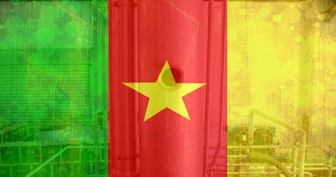 Cameroon flag overlay on industrial factory background