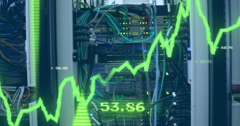 Financial data processing in server room with digital graph overlay