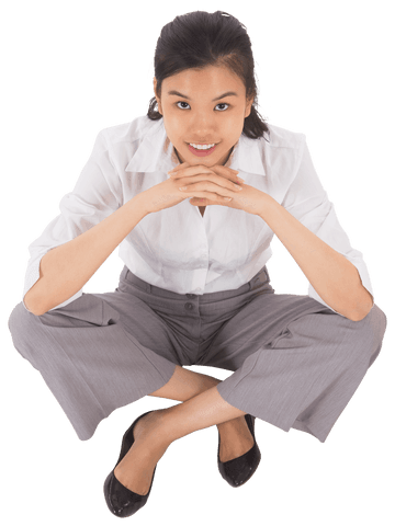 asian businesswoman smiling sitting cross legged on transparent background - Download Free Stock Videos Pikwizard.com