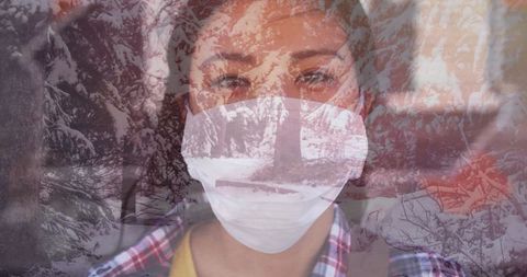 Woman Wearing Face Mask Envisioning Winter Wonderland