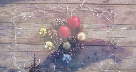Christmas Decoration with Baubles and Pine Cones on Wood - Download Free Stock Images Pikwizard.com