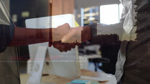 Double Exposure of Handshake in Modern Office Setting
