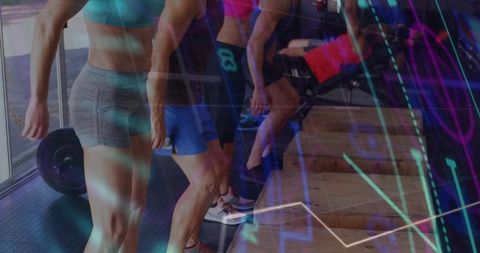 Performing Group Plyometric Box Jumps in Neon-Lit Gym, Athletic Men and Women Training Together