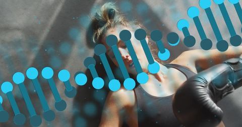 Woman boxing while dna helix overlay representing performance, genetics and wellness