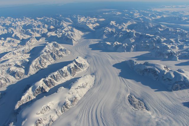 Heimdal Glacier in southern Greenland, in an image captured on Oct. 13, 2015, from NASA Langley Research Center's Falcon 20 aircraft flying 33,000 feet above mean sea level.  NASA’s Operation IceBridge, an airborne survey of polar ice, recently finalized two overlapping campaigns at both of Earth’s poles. Down south, the mission observed a big drop in the height of two glaciers situated in the Antarctic Peninsula, while in the north it collected much needed measurements of the status of land and sea ice at the end of the Arctic summer melt season.  This was the first time in its seven years of operations that IceBridge carried out parallel flights in the Arctic and Antarctic. Every year, the mission flies to the Arctic in the spring and to Antarctica in the fall to keep collect an uninterrupted record of yearly changes in the height of polar ice.  Read more: <a href="http://www.nasa.gov/feature/goddard/nasa-s-operation-icebridge-completes-twin-polar-campaigns" rel="nofollow">www.nasa.gov/feature/goddard/nasa-s-operation-icebridge-c...</a>  Credits: NASA/Goddard/John Sonntag  <b><a href="http://www.nasa.gov/audience/formedia/features/MP_Photo_Guidelines.html" rel="nofollow">NASA image use policy.</a></b>  <b><a href="http://www.nasa.gov/centers/goddard/home/index.html" rel="nofollow">NASA Goddard Space Flight Center</a></b> enables NASA’s mission through four scientific endeavors: Earth Science, Heliophysics, Solar System Exploration, and Astrophysics. Goddard plays a leading role in NASA’s accomplishments by contributing compelling scientific knowledge to advance the Agency’s mission.  <b>Follow us on <a href="http://twitter.com/NASAGoddardPix" rel="nofollow">Twitter</a></b>  <b>Like us on <a href="http://www.facebook.com/pages/Greenbelt-MD/NASA-Goddard/395013845897?ref=tsd" rel="nofollow">Facebook</a></b>  <b>Find us on <a href="http://instagrid.me/nasagoddard/?vm=grid" rel="nofollow">Instagram</a></b>     