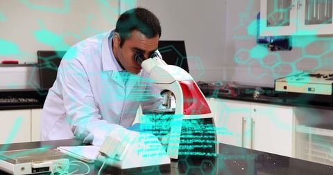 Scientist Analyzing Research Data with Advanced Technology in Laboratory