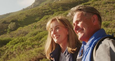 Smiling Senior Couple Hiking on Sunny Day Outdoors Lifestyle - Download Free Stock Images Pikwizard.com