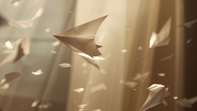 Gliding Paper Airplanes Catching Warm Sunbeams and Dust Motes in Dreamy Studio Soft Bokeh