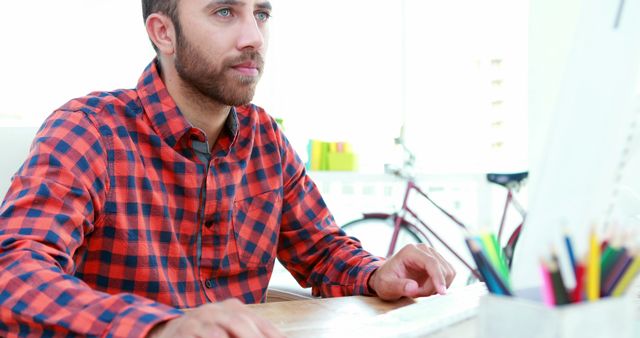 Young Professional Man Working on Desktop Computer in Bright Office - Download Free Stock Images Pikwizard.com