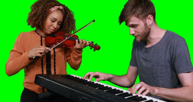 Musicians Playing Violin and Keyboard on Green Screen Background - Download Free Stock Images Pikwizard.com