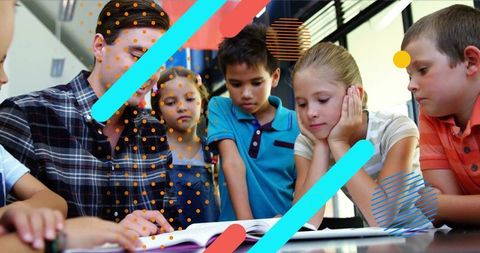 Diverse School Children Collaborating with Teacher at Learning Table