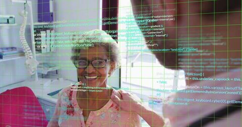 Smiling senior woman with nurse raising arm in clinic, digital grid and code interface