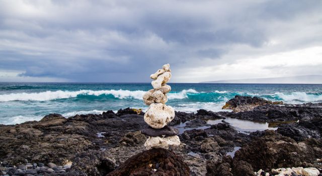 White Stone Balancing on Beach Shore - Download Free Stock Photos Pikwizard.com