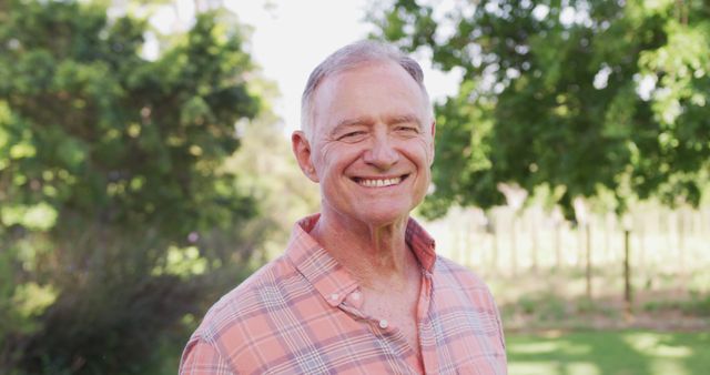 Senior Man Smiling Outdoors on a Sunny Day - Download Free Stock Images Pikwizard.com