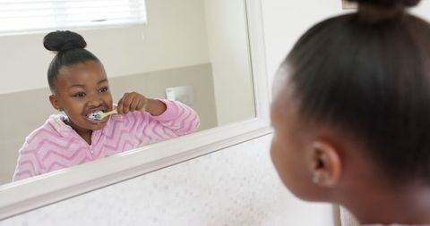 African American Girl Brushing Teeth and Practicing Healthy Habits - Download Free Stock Images Pikwizard.com