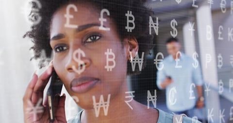 African American Woman Communicating with Global Currency Symbols Transparency