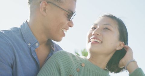 Happy Couple Enjoying Sunny Day on Promenade