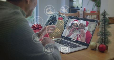 Festive Video Call with Senior Man and Grandparent During Christmas
