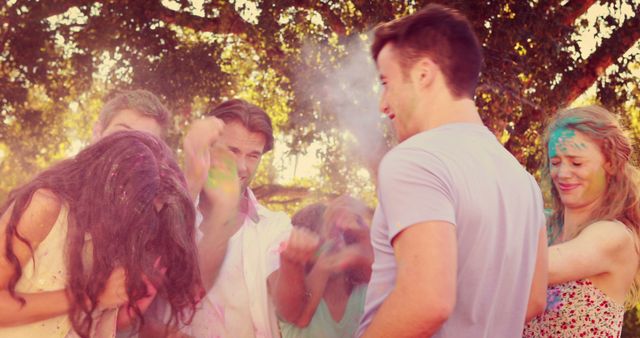 Young Friends Celebrating Holi Festival with Color Powders Outdoors - Download Free Stock Images Pikwizard.com